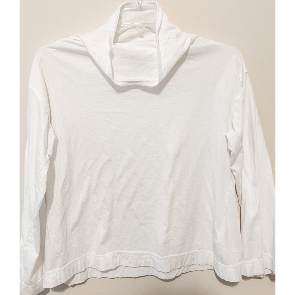 Free People white turtleneck with fun flare sleeves
